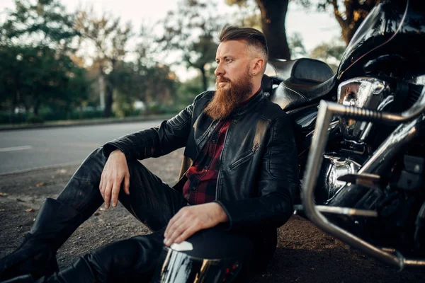a man wearing a leather jacket