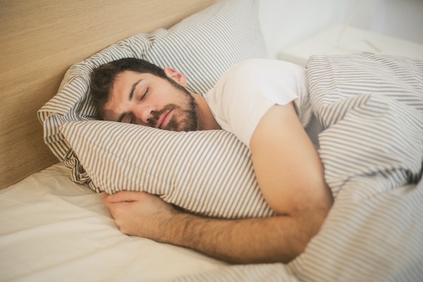 A Man Having A Restful Sleep