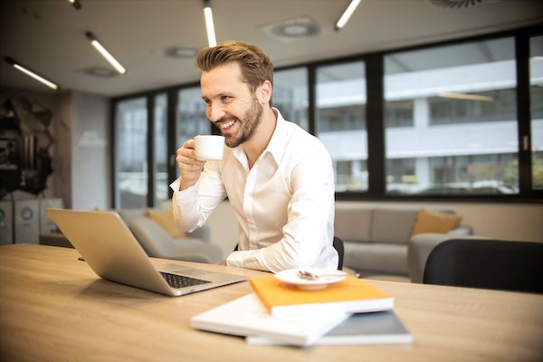 A Man Taking A Coffee Break