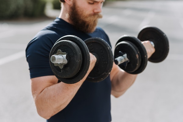 A Man Doing Bicep Curls