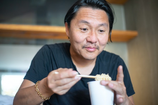 A Man Enjoying His Food