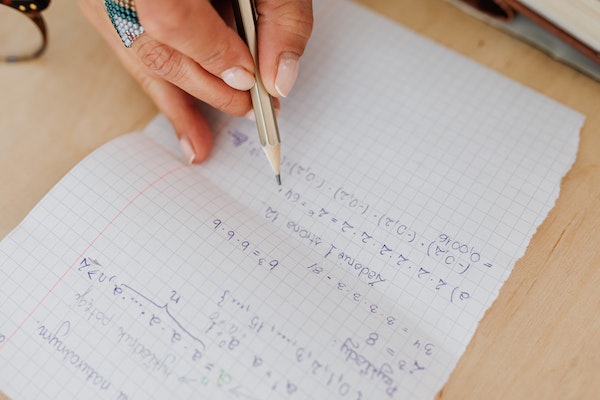A Man Solving Maths