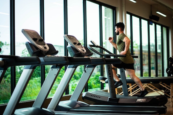 A Man Doing His Cardio On A Treadmill