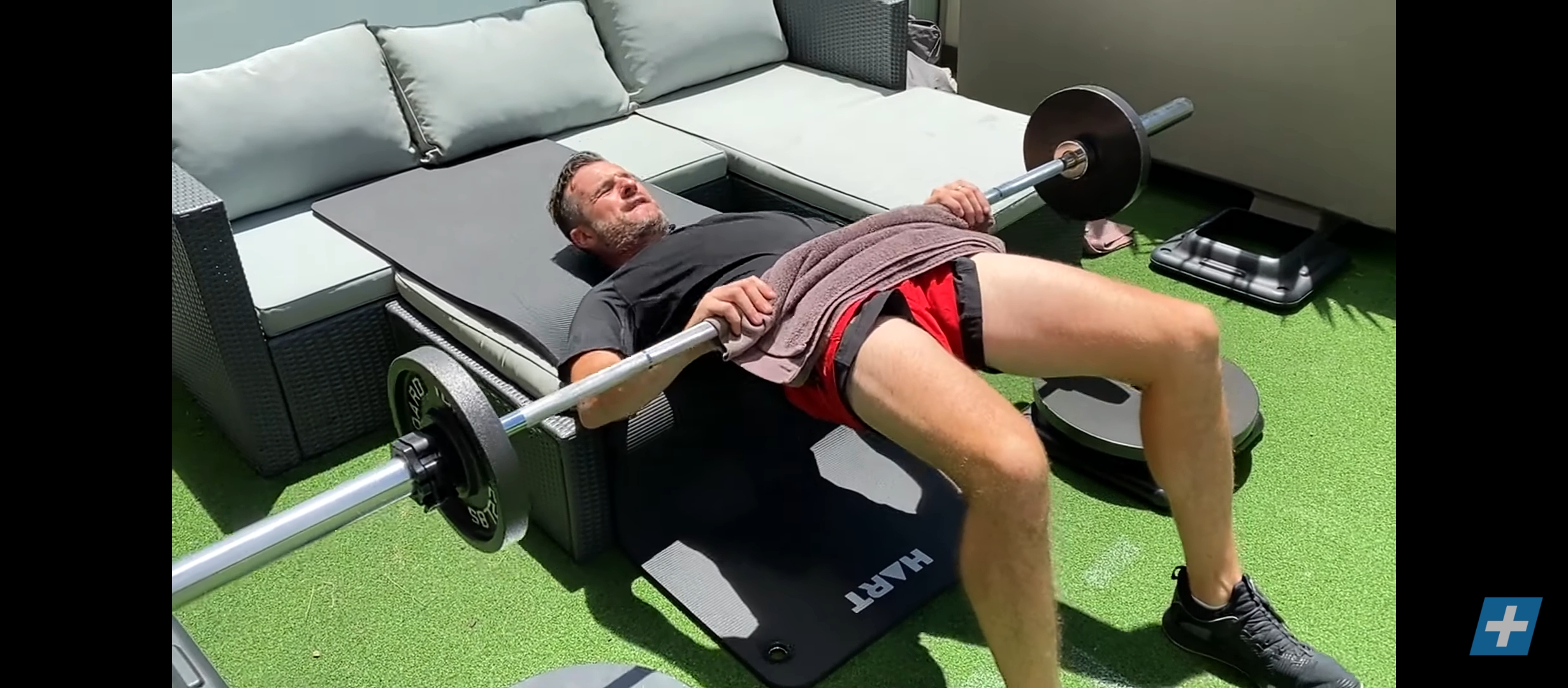 A Man Doing Barbell Hip Thrust As One Of His Hamstring Workouts