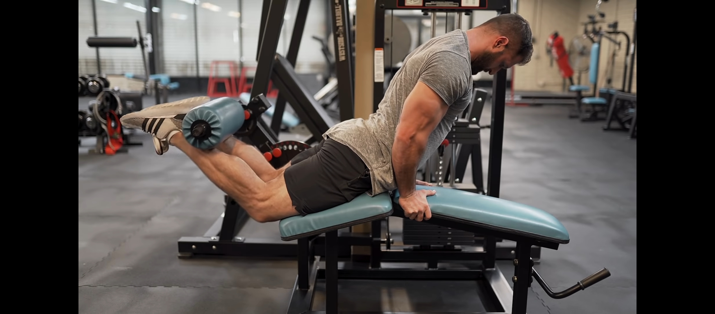 A Man Doing Hamstring Curls