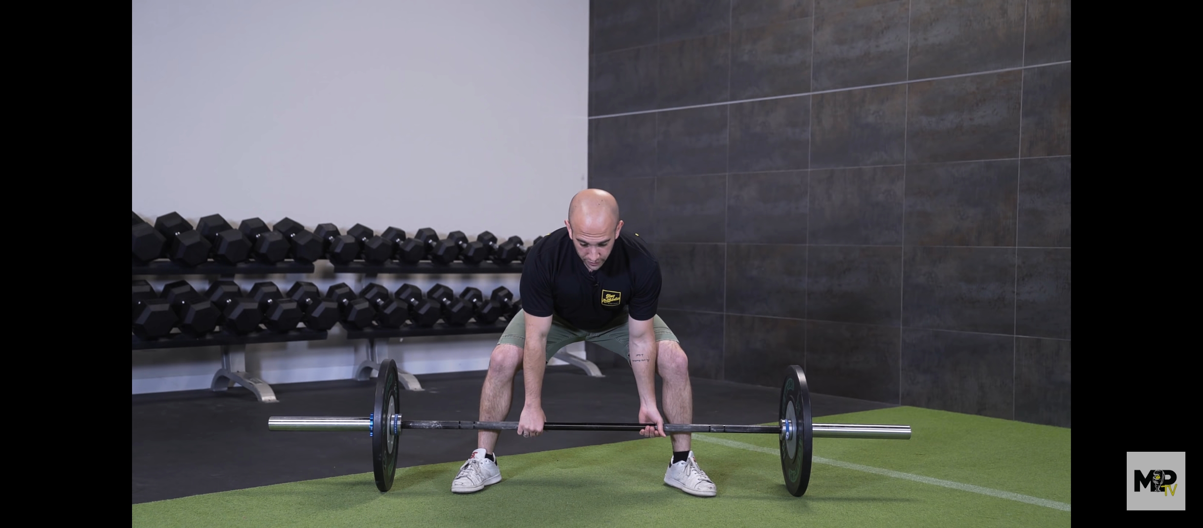 A Man Doing Sumo Deadlifts