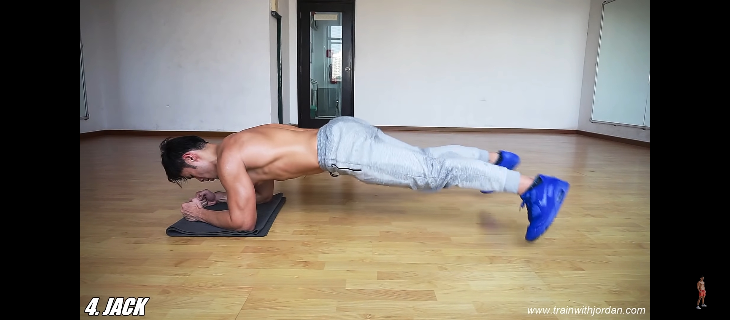 A Man Doing Plank Jacks