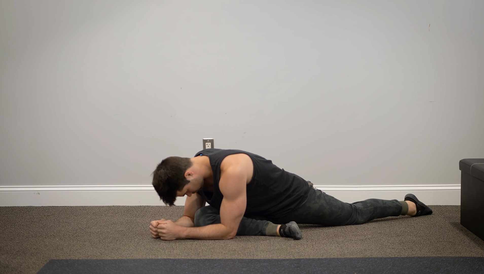 A Man Doing The Pigeon Pose