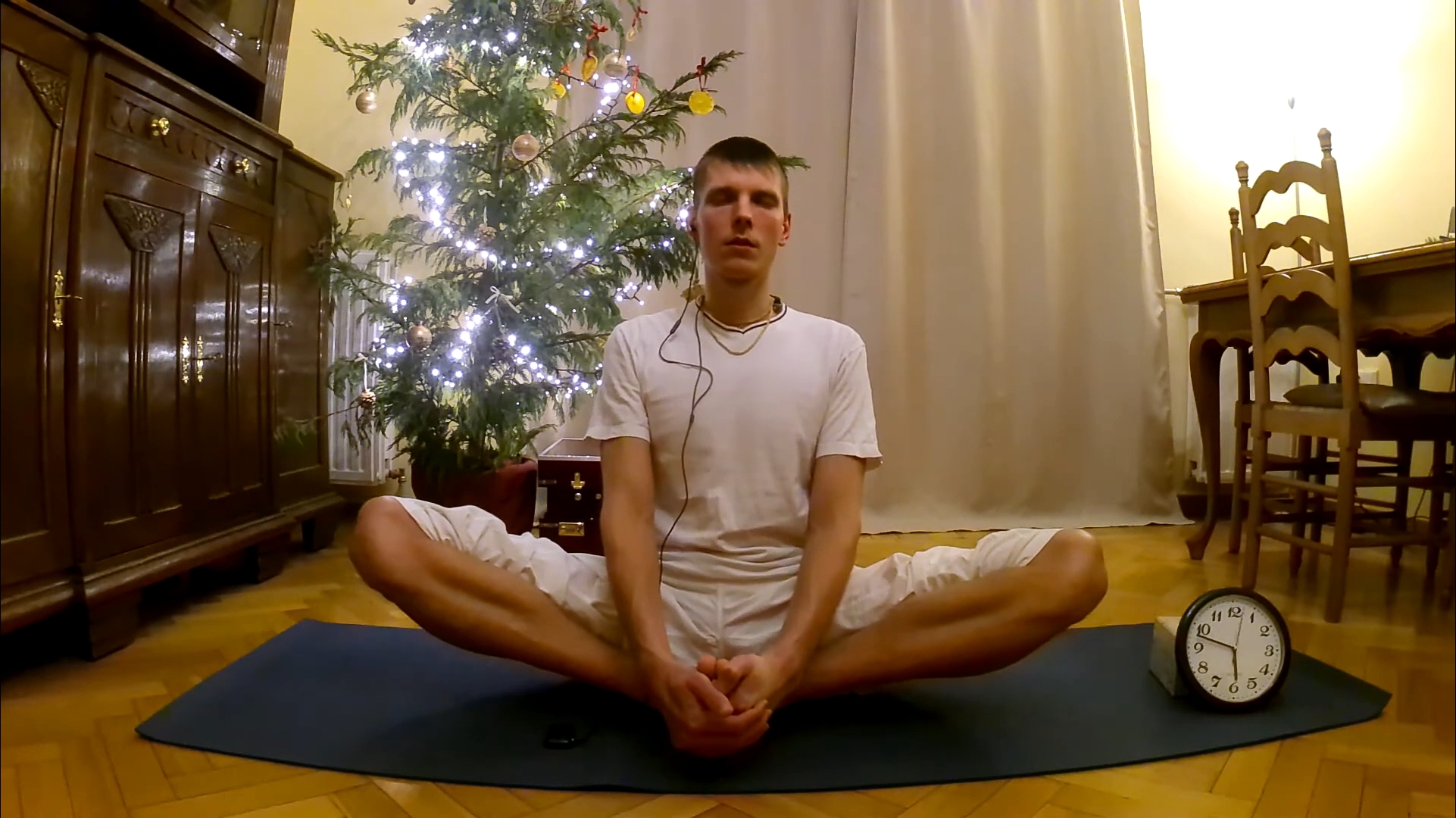 A Man Doing Seated Butterfly Stretch