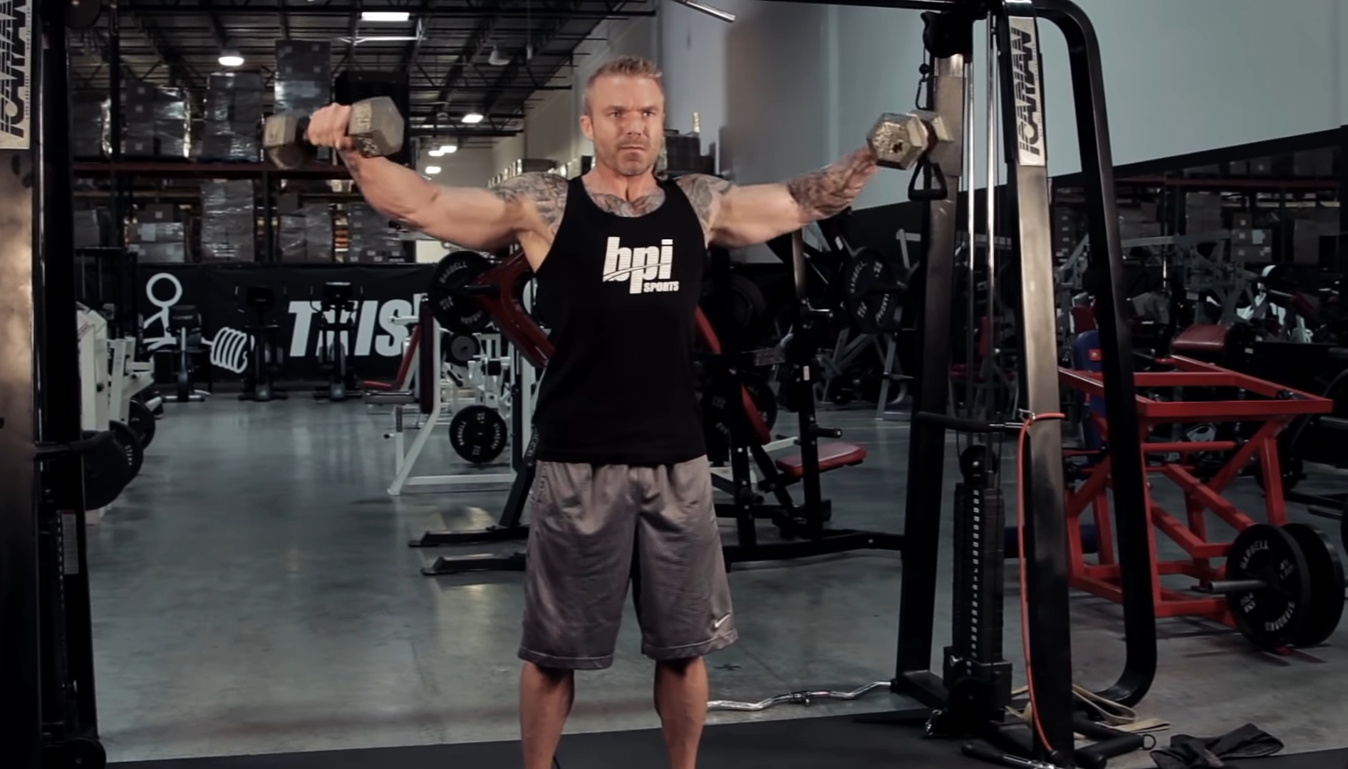A Man Doing One Of The Best Alternatives To Upright Rows