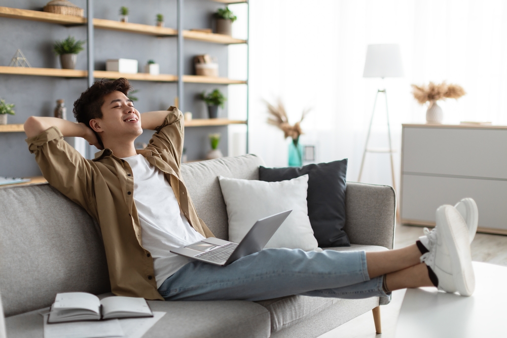 a guy relaxing in the living room 