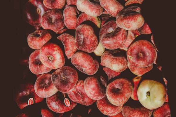 pile of round red fruits