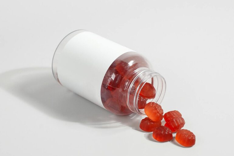 gummies vitamin supplement on plastic bottle container